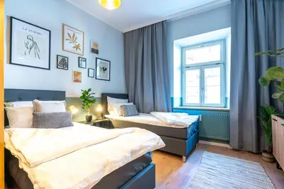 Ein Bett oder Betten in einem Zimmer der Unterkunft City Center Retreat mitten in Augsburg