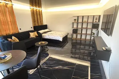 Ein Sitzbereich in der Unterkunft Optimus Apartment