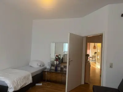Ein Bett oder Betten in einem Zimmer der Unterkunft Gemütliche Unterkunft in Landsberg