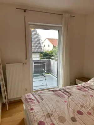 Ein Bett oder Betten in einem Zimmer der Unterkunft Moderne Unterkunft - nah am Flughafen MUC und TU München
