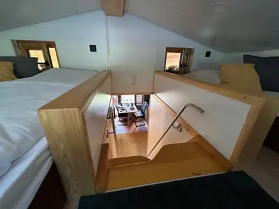 Ein Bett oder Betten in einem Zimmer der Unterkunft NATURAMA Glockenalm
