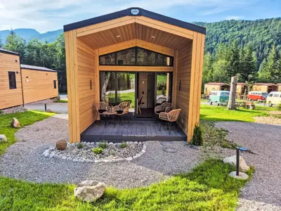 Ein Garten an der Unterkunft Holiday Home Tiny Haus Glockenalm-Villa Maria by Interhome