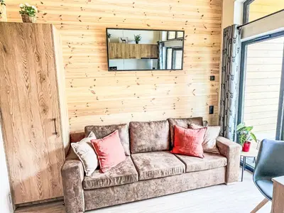 Ein Sitzbereich in der Unterkunft Holiday Home Tiny Haus Glockenalm-Villa Maria by Interhome