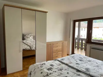 Ein Bett oder Betten in einem Zimmer der Unterkunft Ferienhaus Partenkirchen