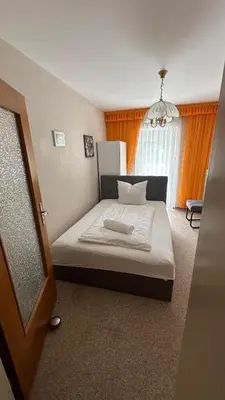 Ein Bett oder Betten in einem Zimmer der Unterkunft Tabita 1 Apartment with 3 rooms if needed 4 or 5 rooms