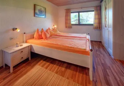 Ein Bett oder Betten in einem Zimmer der Unterkunft Haus Klinger