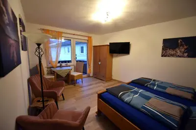 Ein Bett oder Betten in einem Zimmer der Unterkunft Ferienwohnung Am Rathaus