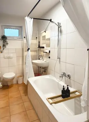 Ein Badezimmer in der Unterkunft Familienoase nahe Innenstadt