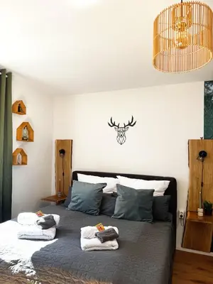Ein Bett oder Betten in einem Zimmer der Unterkunft Familienoase nahe Innenstadt