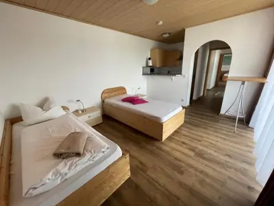 Ein Bett oder Betten in einem Zimmer der Unterkunft Appartement 2 - b66205