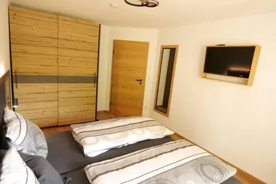 Ein Bett oder Betten in einem Zimmer der Unterkunft Ferien by Wallners
