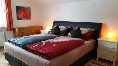 Ein Bett oder Betten in einem Zimmer der Unterkunft Ferienwohnung Sonnenblume