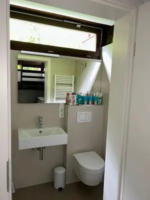 Ein Badezimmer in der Unterkunft Das Rote Haus am See