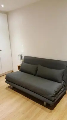 Ein Sitzbereich in der Unterkunft Offen gestaltetes Design Apartment in Bad Wiessee, 350m vom See