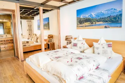 Ein Bett oder Betten in einem Zimmer der Unterkunft Ferienwohnung Linderspitzblick
