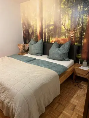 Ein Bett oder Betten in einem Zimmer der Unterkunft Haus Tala