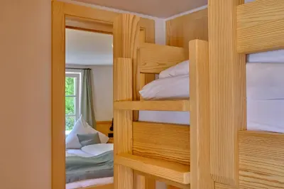 Ein Bett oder Betten in einem Zimmer der Unterkunft Forsthaus Valepp