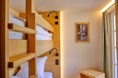 Ein Bett oder Betten in einem Zimmer der Unterkunft Forsthaus Valepp