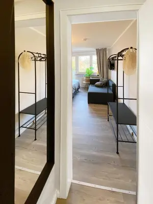 Ein Bett oder Betten in einem Zimmer der Unterkunft Modernes City Apartment
