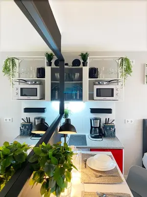 Küche/Küchenzeile in der Unterkunft Modernes City Apartment