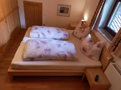 Ein Bett oder Betten in einem Zimmer der Unterkunft Ferienwohnungen Nagel, Kreuth-Enterbach