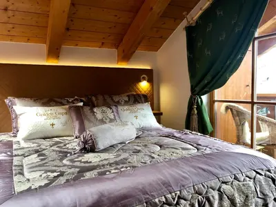 Ein Bett oder Betten in einem Zimmer der Unterkunft Golden GaPa Penthouse 1