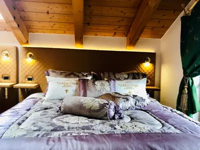 Ein Bett oder Betten in einem Zimmer der Unterkunft Golden GaPa Penthouse 1