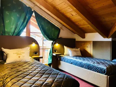 Ein Bett oder Betten in einem Zimmer der Unterkunft Golden GaPa Penthouse 1
