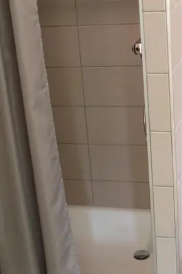 Ein Badezimmer in der Unterkunft Pension Hubertusstuben