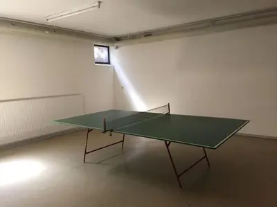 Tischtennis in der Unterkunft Ferienwohnung Filli mit Sauna und Pool im Haus oder in der Nähe