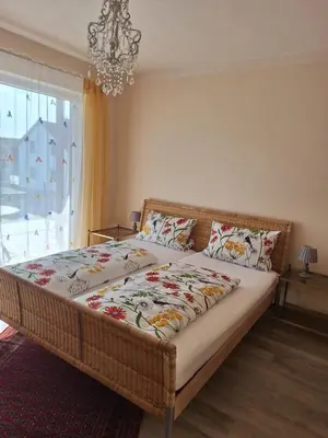 Ein Bett oder Betten in einem Zimmer der Unterkunft Gästehaus Hilda