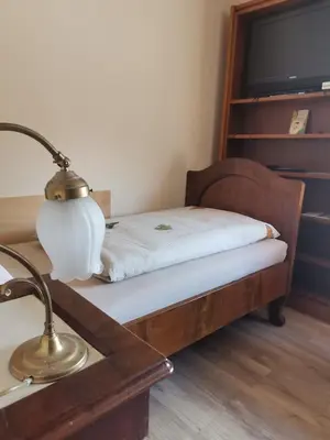 Ein Bett oder Betten in einem Zimmer der Unterkunft Gästehaus Hilda