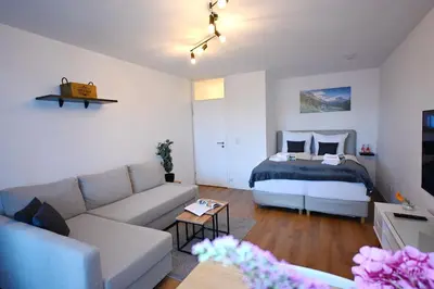 Ein Bett oder Betten in einem Zimmer der Unterkunft ChiemseeTraum