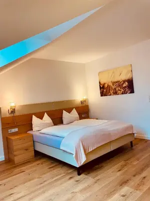 Ein Bett oder Betten in einem Zimmer der Unterkunft Brandmayerhof