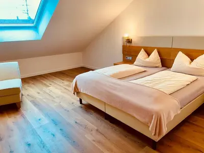 Ein Bett oder Betten in einem Zimmer der Unterkunft Brandmayerhof