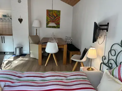 Ein Bett oder Betten in einem Zimmer der Unterkunft Apartment Sachrang