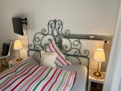 Ein Bett oder Betten in einem Zimmer der Unterkunft Apartment Sachrang