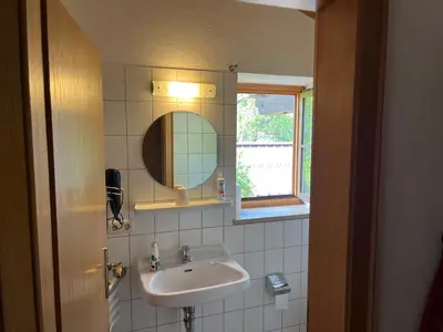 Ein Badezimmer in der Unterkunft Apartment Sachrang