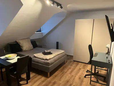 Ein Bett oder Betten in einem Zimmer der Unterkunft Binderhof