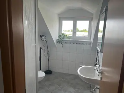 Ein Badezimmer in der Unterkunft Binderhof