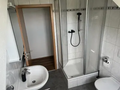 Ein Badezimmer in der Unterkunft Binderhof
