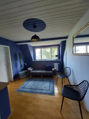 Ein Sitzbereich in der Unterkunft Altstadthaus an der Kleinen Donau