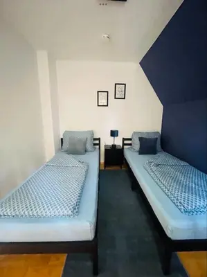 Ein Bett oder Betten in einem Zimmer der Unterkunft Altstadthaus an der Kleinen Donau