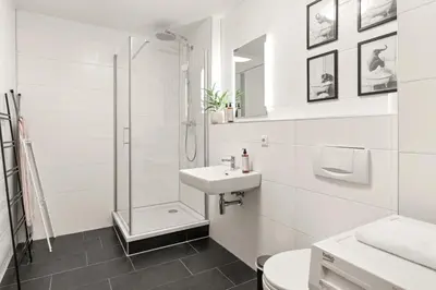 Ein Badezimmer in der Unterkunft YUVA HOMES in Untermeitingen