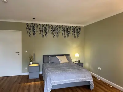 Ein Bett oder Betten in einem Zimmer der Unterkunft Leo Flat