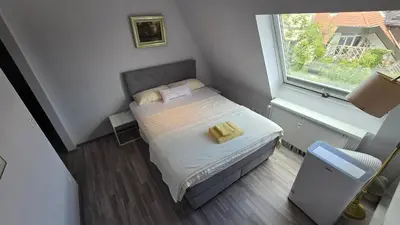 Ein Bett oder Betten in einem Zimmer der Unterkunft Munich Penthouse Rooftop Terrace