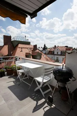 Ein Balkon oder eine Terrasse in der Unterkunft Munich Penthouse Rooftop Terrace