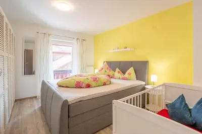 Ein Bett oder Betten in einem Zimmer der Unterkunft Haus Bischoff 1