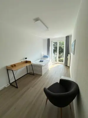Ein Bett oder Betten in einem Zimmer der Unterkunft Kirschbaum Apartment