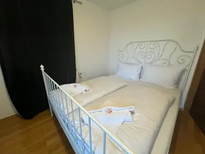 Ein Bett oder Betten in einem Zimmer der Unterkunft ღLIBORIA I Alpenblick Landhaus